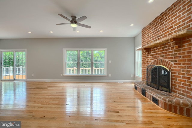 10905 Powers Ave, Cockeysville, MD 21030 - unfurnished living room featuring wood finished floors, recessed lighting, a fireplace, and a ceiling fan