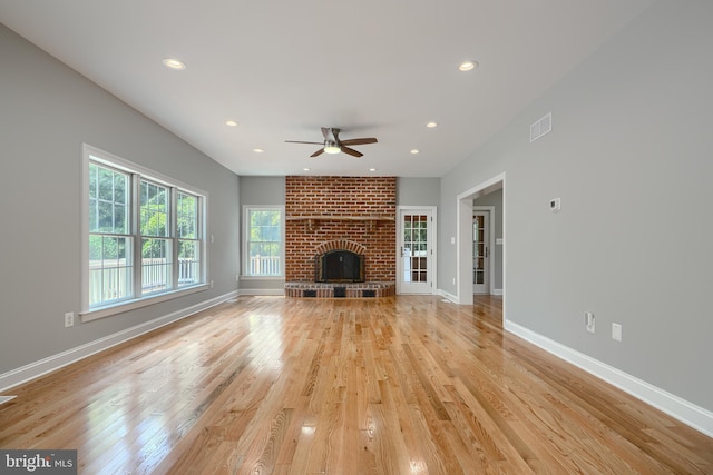 10905 Powers Ave, Cockeysville, MD 21030 - unfurnished living room featuring a ceiling fan, light wood finished floors, recessed lighting, and a fireplace