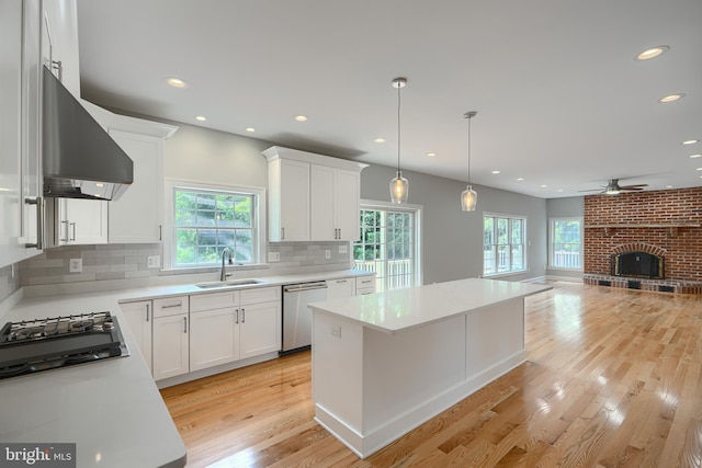 10905 Powers Ave, Cockeysville, MD 21030 - kitchen with stainless steel appliances, wall chimney range hood, open floor plan, recessed lighting, and backsplash