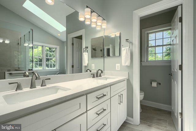 10905 Powers Ave, Cockeysville, MD 21030 - full bathroom with double vanity, a tile shower, lofted ceiling, and marble look tiles