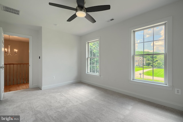 10905 Powers Ave, Cockeysville, MD 21030 - carpeted empty room with a chandelier and a ceiling fan
