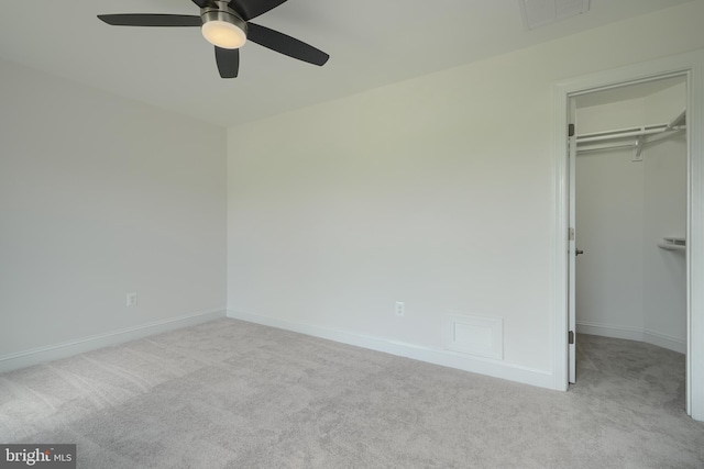 10905 Powers Ave, Cockeysville, MD 21030 - unfurnished bedroom with carpet, a walk in closet, a closet, and a ceiling fan