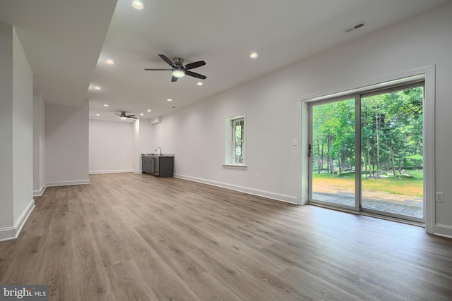 10905 Powers Ave, Cockeysville, MD 21030 - unfurnished living room with a ceiling fan, wood finished floors, and recessed lighting