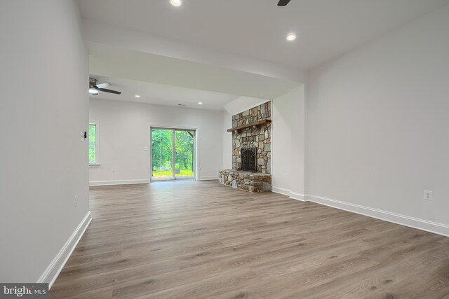 10905 Powers Ave, Cockeysville, MD 21030 - unfurnished living room featuring a ceiling fan, wood finished floors, recessed lighting, and a fireplace