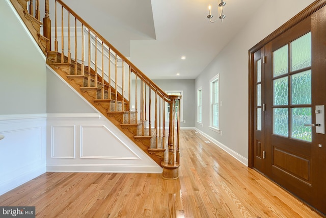 10905 Powers Ave, Cockeysville, MD 21030 - entryway with wood finished floors, stairs, a wainscoted wall, and recessed lighting