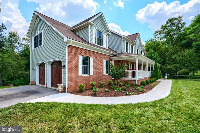 10905 Powers Ave, Cockeysville, MD 21030 - view of side of home featuring asphalt driveway, a garage, covered porch, a yard, and a shingled roof