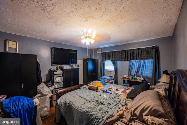 41161/2 Belle Ave, Baltimore, MD 21215 - bedroom with a textured ceiling, wood finished floors, ceiling fan, and cooling unit