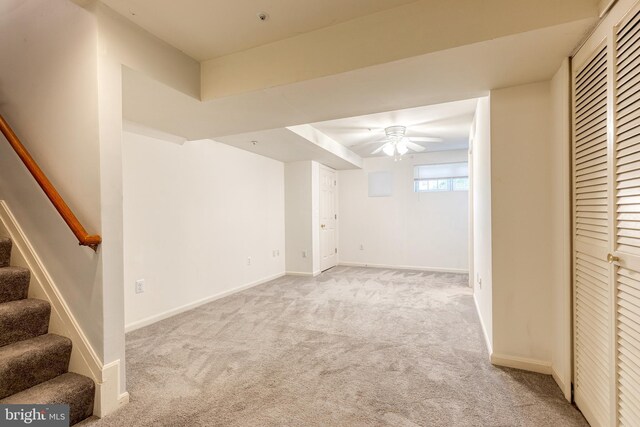 577 Francis Nicholson Way, Annapolis, MD 21401 - below grade area featuring light colored carpet, ceiling fan, and stairs