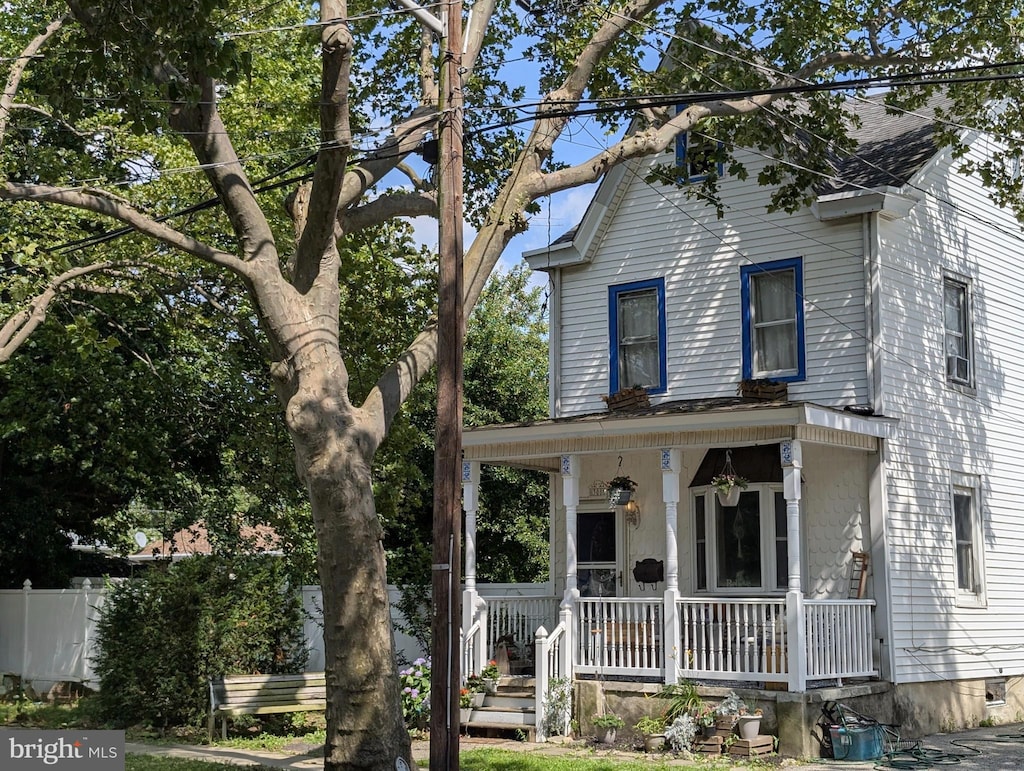 308 W 3rd St, Palmyra, NJ 08065 - view of front facade with a porch