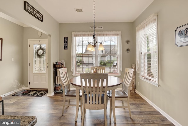 1283 Yarmouth Ln, New Cumberland, PA 17070 - dining room with dark wood finished floors and a chandelier