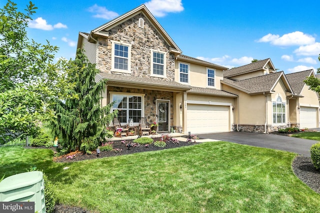 1283 Yarmouth Ln, New Cumberland, PA 17070 - traditional home featuring stone siding, stucco siding, driveway, and a front lawn