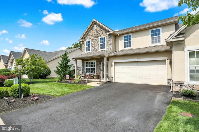 1283 Yarmouth Ln, New Cumberland, PA 17070 - traditional-style house with stone siding, stucco siding, driveway, and a front lawn