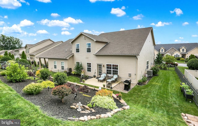 1283 Yarmouth Ln, New Cumberland, PA 17070 - rear view of property with a patio, an outdoor living space, a shingled roof, a fenced backyard, and a residential view