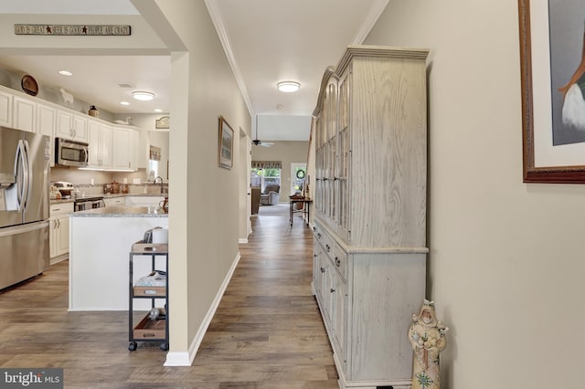 1283 Yarmouth Ln, New Cumberland, PA 17070 - corridor with wood finished floors, crown molding, and recessed lighting