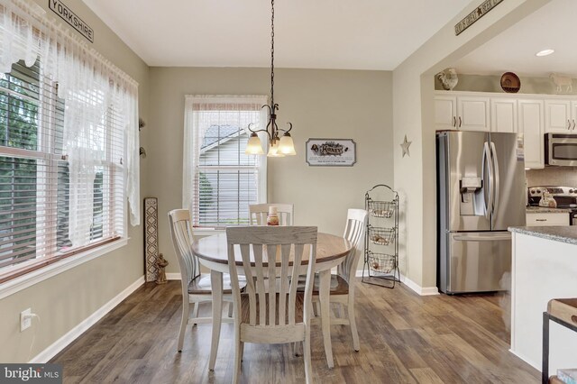 1283 Yarmouth Ln, New Cumberland, PA 17070 - dining room featuring a chandelier and dark wood-type flooring