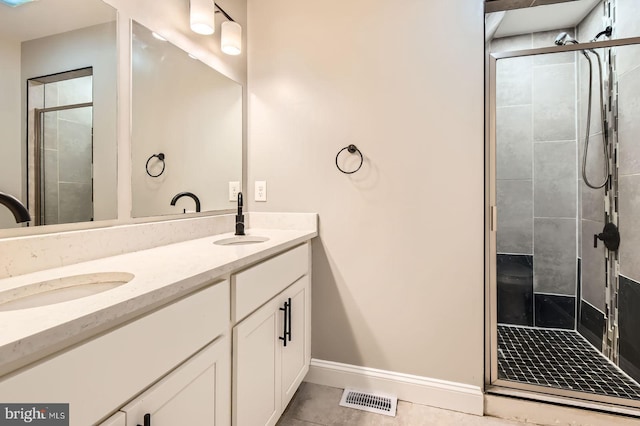 1508 N Eden St, Baltimore, MD 21213 - full bathroom with double vanity, a shower stall, and tile patterned floors