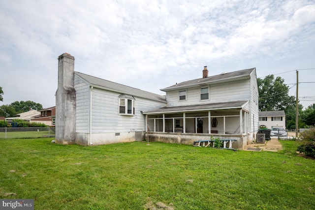 1319 Kenwood Rd, Wilmington, DE 19805 - rear view of property featuring a chimney, a sunroom, and crawl space