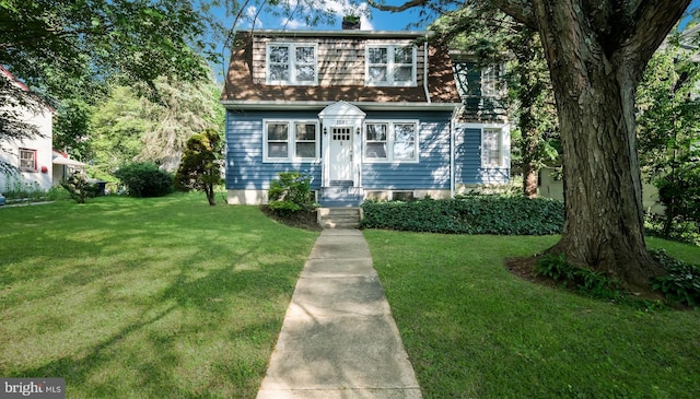 1081 Wynnwood Rd, Abington, PA 19001 - view of front of property with a front lawn, mansard roof, and a chimney