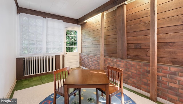 1081 Wynnwood Rd, Abington, PA 19001 - carpeted dining area with radiator and wood walls
