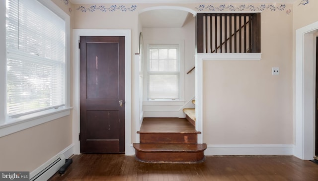 1081 Wynnwood Rd, Abington, PA 19001 - entryway with wood finished floors, baseboard heating, and healthy amount of natural light