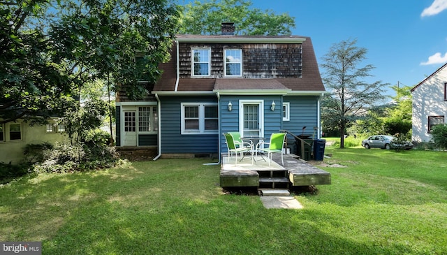 1081 Wynnwood Rd, Abington, PA 19001 - back of house with a wooden deck, a chimney, a lawn, and roof with shingles