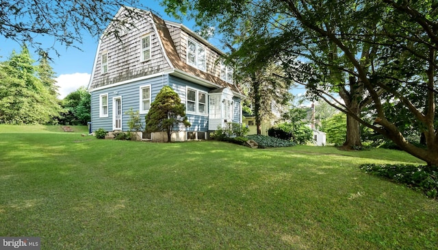 1081 Wynnwood Rd, Abington, PA 19001 - view of side of property featuring a gambrel roof and a yard