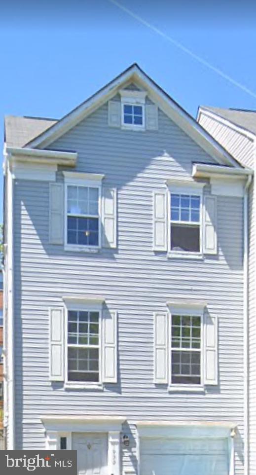 1900 Tremont St SE, Washington, DC 20020 - view of side of property with a garage
