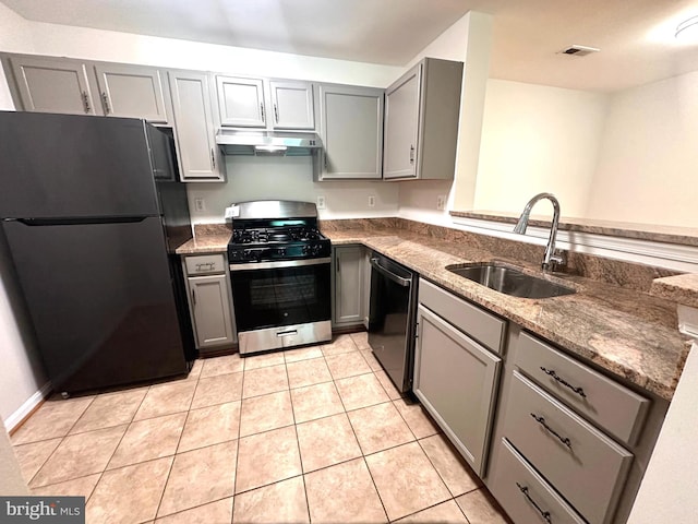 18815 Sparkling Water Dr Unit 4-O, Germantown, MD 20874 - kitchen featuring appliances with stainless steel finishes, gray cabinetry, under cabinet range hood, and dark stone countertops