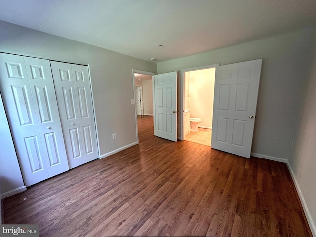 18815 Sparkling Water Dr Unit 4-O, Germantown, MD 20874 - unfurnished bedroom featuring wood finished floors and a closet