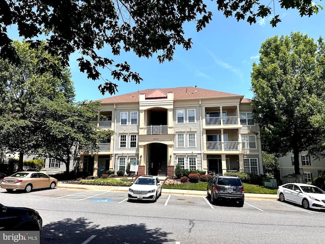 18815 Sparkling Water Dr Unit 4-O, Germantown, MD 20874 - view of property featuring uncovered parking