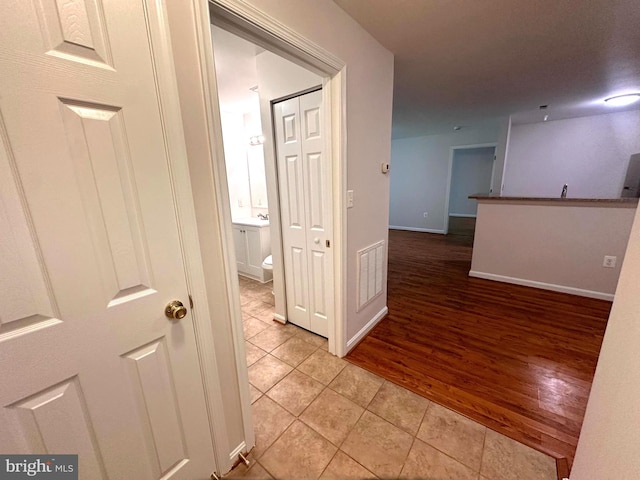 18815 Sparkling Water Dr Unit 4-O, Germantown, MD 20874 - hall featuring light tile patterned floors and baseboards
