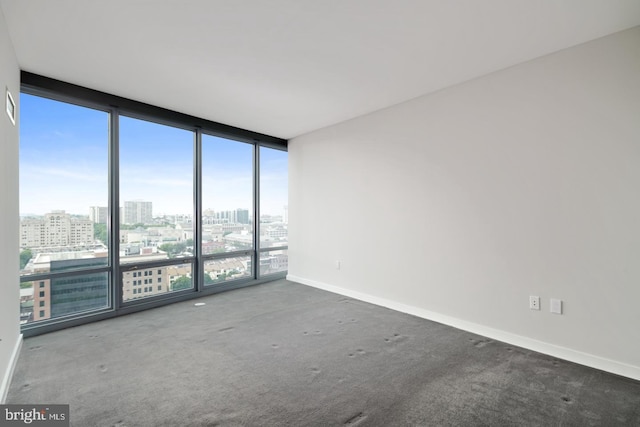 2101 Market St Unit 1902, Philadelphia, PA 19103 - carpeted empty room with a city view, plenty of natural light, and expansive windows
