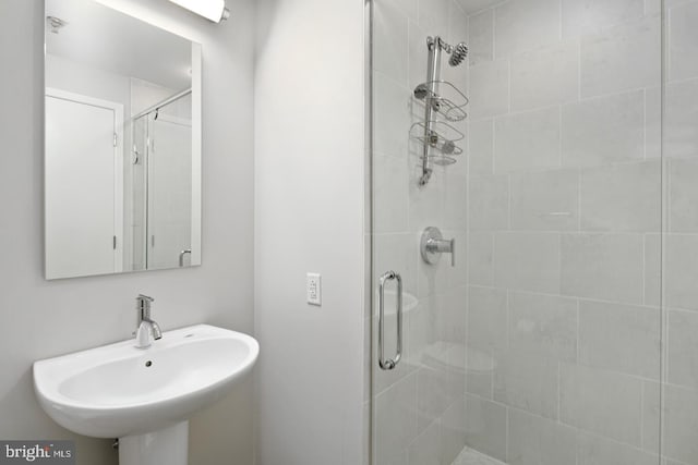 2101 Market St Unit 1902, Philadelphia, PA 19103 - full bathroom featuring a stall shower and a sink