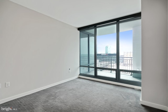 2101 Market St Unit 1902, Philadelphia, PA 19103 - unfurnished room featuring dark colored carpet and floor to ceiling windows