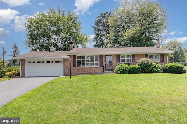 114 Brookside Ave, Hershey, PA 17033 - ranch-style house featuring a chimney, a garage, driveway, and brick siding