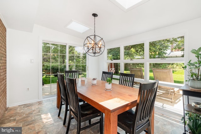 114 Brookside Ave, Hershey, PA 17033 - dining room with plenty of natural light, a chandelier, stone finish floors, and vaulted ceiling
