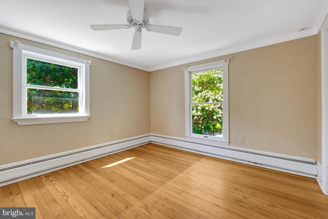 1012 Grant St, Herndon, VA 20170 - unfurnished room featuring crown molding, wood finished floors, wallpapered walls, a baseboard heating unit, and ceiling fan