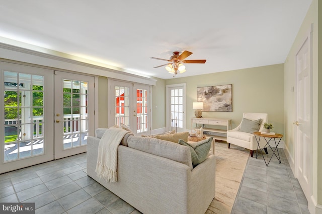 1012 Grant St, Herndon, VA 20170 - living area featuring light tile patterned flooring, french doors, and ceiling fan