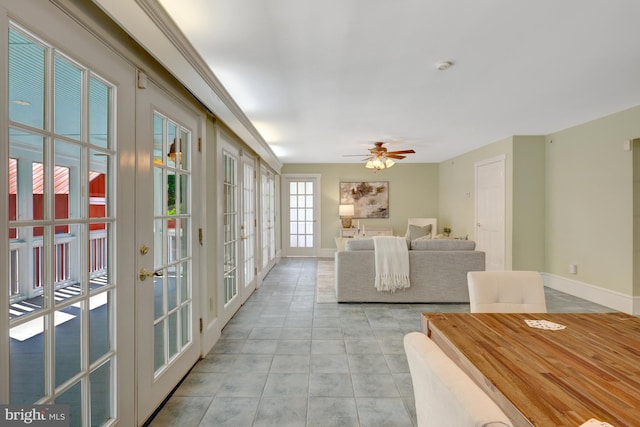 1012 Grant St, Herndon, VA 20170 - living room featuring french doors, a ceiling fan, and light tile patterned flooring