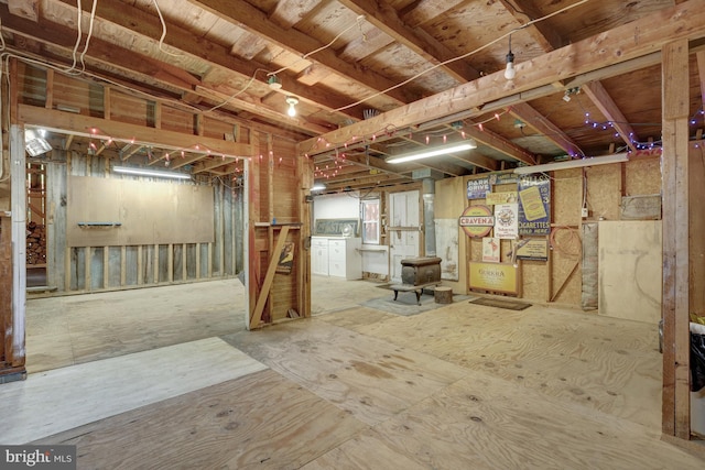 1012 Grant St, Herndon, VA 20170 - unfinished below grade area featuring a wood stove