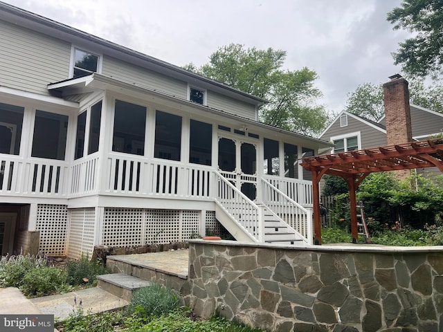 1012 Grant St, Herndon, VA 20170 - view of property exterior featuring a sunroom, a pergola, and stairway