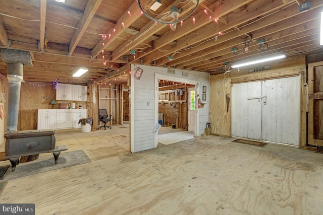 1012 Grant St, Herndon, VA 20170 - basement featuring a wood stove