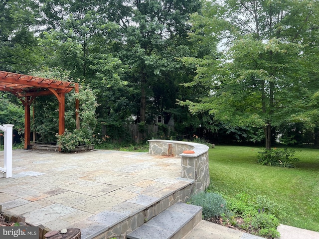 1012 Grant St, Herndon, VA 20170 - view of patio featuring a pergola and view of wooded area