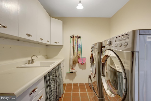 1012 Grant St, Herndon, VA 20170 - laundry room with cabinet space, washer and dryer, and tile patterned floors