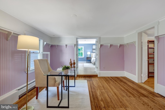 1012 Grant St, Herndon, VA 20170 - dining area featuring wood finished floors and baseboard heating