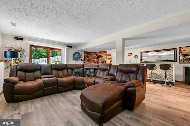 47 Sheridan Rd, Arnold, MD 21012 - living room featuring a textured ceiling and wood finished floors
