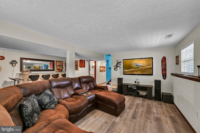 47 Sheridan Rd, Arnold, MD 21012 - cinema room featuring wood finished floors and a textured ceiling