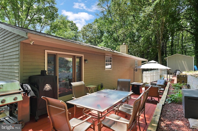 47 Sheridan Rd, Arnold, MD 21012 - view of patio featuring outdoor dining space, grilling area, a deck, and a shed