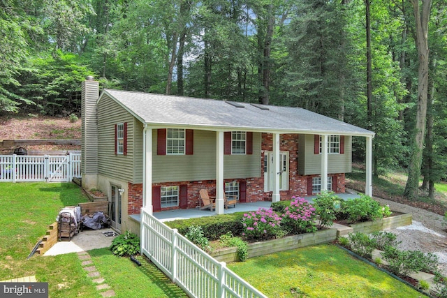 47 Sheridan Rd, Arnold, MD 21012 - raised ranch featuring a chimney and a shingled roof