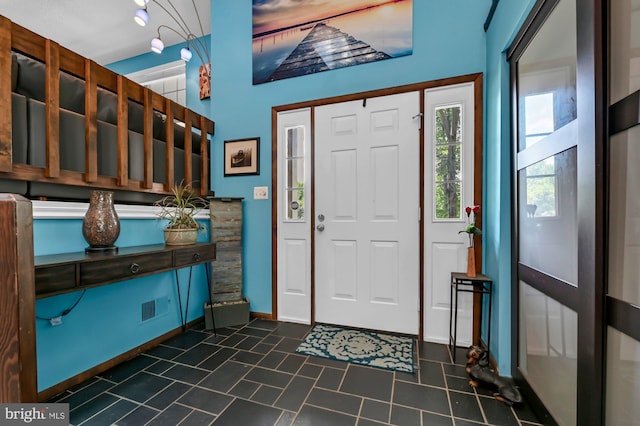 47 Sheridan Rd, Arnold, MD 21012 - foyer entrance featuring baseboards and dark tile patterned floors